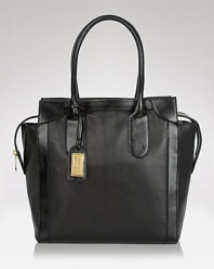 Perfect practical style with this top handle tote from Badgley Mischka, boasting a structured shape and glossy trims. This spacious style will handle all the essentials - so carry it to add polish to your daytime arsenal.