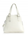 A refined dome shape and unique quilted chevron pattern make this knockout style one that will stand out in a crowd. Shiny silvertone hardware an an optional crossbody strap add versatility to this chic design.