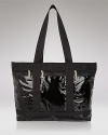 This shiny, durable patent nylon tote is roomy enough for chic weekend travel. By LeSportsac.