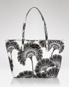 Go graphic and offset your daytime look with this printed bag from kate spade new york. Its spacious yet sleek design makes this floral tote a practical pick.