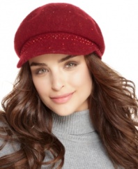 A beaded brim gives this chic newsboy knit hat by Nine West sparkling dimension.