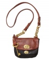Two-tone leather and chunky goldtone hardware accentuate the modern silhouette of this soft flap bag from Fossil.