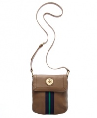 A casual crossbody with refined elegance. This classic design by Tommy Hilfiger features an easy-to-wear silhouette with signature hardware and center stripe.