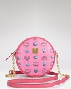 MCM's signature logo-stamped bag goes girly in bubble-gum pink. Shoulder the sweet style with frills for over-the-top feminine flair.
