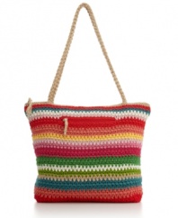 Keep things casual with this around-town bag from The Sak. Choose a solid or striped design for an easy-going look with a convenient zip front pocket and pretty crochet exterior.