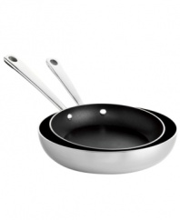 Making a brilliant breakfast is easy with this tri-ply duo of French skillets. Raised sides keep splatter and mess to a minimum while you flip and turn spinach & feta omelets, stuffed French toast and other savory morning treats. A bonded stainless steel construction features a pure aluminum core and three layers of Eterna® nonstick coating for unbeatable heating and effortless release. Lifetime limited warranty.
