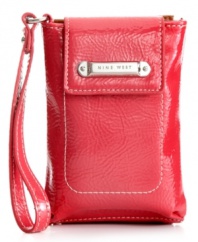 Now you're talking. Let your spring fling last all year 'round with this colorful, compact design from Nine West that features plenty of compartments to stash cash, cards, coins and phone without a worry. And the adorable wristlet strap instantly turns a functional case into a fashionable accessory.