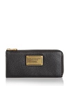 A chic leather wallet with innovative half-zip detail from MARC BY MARC JACOBS.