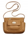 Wear with t-shirt and jeans or your favorite frilly frock, this versatile crossbody from Calvin Klein goes anywhere with ease. Buttery-soft leather is adorned with subtle golden hardware and gracious turnlock closure, while plenty of pockets inside and out offer effortless organization.