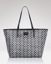 kate spade new york's printed woven tote is designed for the on-the-go urbanista. Shoulder the graphic patent-trimmed style when pretty practicality is paramount.