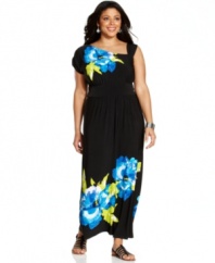 Snag season-perfect style with AGB's one-shoulder plus size maxi dress, blooming a floral print.