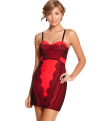 Dark lace overlays a bold and hot hue, creating sexy, lingerie style on a party dress designed to leave the boys speechless! From Rampage.