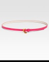 How charming, this skinny belt offers a pop of on-trend, neon color and a unique, charmed buckle closure.About .5 widePVCCharm on buckle closureImported