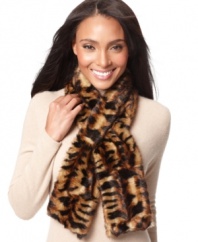 Enliven your winter wardrobe with Calvin Klein's leopard-print pull-through scarf! It's a perennially chic pattern you'll wear well beyond this season.