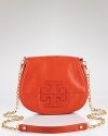 Tory Burch's leather mini bag is a proof that luxe things come in little packages. Boasting a vibrant hue and the label's signature stamp, this compact is a bold bet after dark.