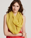 Effortlessly wrapped, this Eileen Fisher scarf lends a luxe touch to everyday styles.