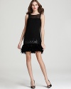 Made for the dance floor, this Bailey 44 dress touts a playful sequin- and feather-embellished hem.
