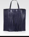 Long fringe detailing adds a touch of edge to this structured carryall design of smooth calfskin leather. Double top handles, 7 dropMagnetic snap closureOne inside open pocket13½W X 14H X 5¼DMade in Italy