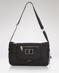 Glamor-girl brand Juicy Couture takes a practical approach to accessorizing with this nylon satchel. Packed with pockets and ideally sized for days on the go, it perfects effortless style.
