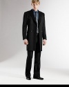 A classic wool topcoat features a double-breasted front and signature GG lining. Double-breasted buttonfront Three waist flap pockets Signatur elining About 34½ from shoulder to hem Wool Dry clean Made in Italy 