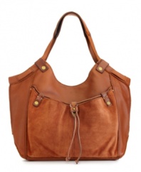 Give any laid-back look an instant artisan appeal with this boho-chic silhouette from Lucky Brand. Butter-soft leather, burnished golden hardware and drawstring detail add creative cache, for a look that imparts a free-spirited feeling.