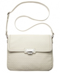 For that tech-savvy girl on-the-go, this signature 9 embossed iPad crossbody from Nine West is a fashion 10.  Polished silver-tone hardware complements the delicate detail stitching, while the fully lined interior safely stows iPad and other essentials with ease.