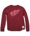 Go big or go home. Rep your Wings with pride (and stay warm in the rink) with this waffle-knit thermal t shirt from Reebok.