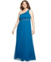 Beautiful embellishment at the neckline and waist lend sparkling style to this flattering plus size evening gown from Xscape.