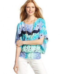 Style&co.'s petite top features an exotic, colorful print and a blouson-like fit that looks amazing paired with slim-fitting white jeans. (Clearance)