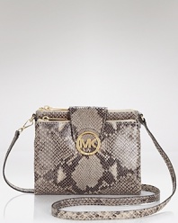 MICHAEL Michael Kors proves mini is all you need with this patent crossbody bag. With it's bold logo and glossy python embossed leather exterior, it's our pick for getting it right at night.