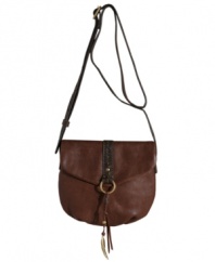 Light as feather, chic as a crossbody: this boho-chic leather purse from Lucky Brand is subtly embossed with a feather design echoed by the feather and bead charm.