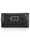 GUESS's Karima multifunction clutch retools the so-hot quilting trend with logo lettering and a patent gloss.