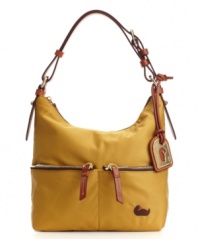 Dooney & Bourke takes their popular pocket purse silhouette and puts a new spin on it with a lightweight, nylon body that's available in a fresh crop of colors.