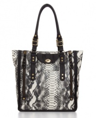 Rock-chic drama: with a python print and edgy goldtone hardware, the Chatter Box tote will get them talking.