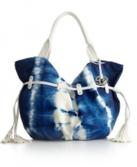 A far out bag that'll add some '60's cool to your modern day look. The Woodstock Shoulder Bag from Red by Marc Ecko features a tie dye-inspired exterior, silvertone hardware and a unique drawstring accent with tassels at sides.