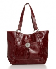 Contrast stitching highlights the contoured front pocket on this glossy croc tote from Nine West.