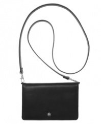 With a trio of zip compartments and a detachable crossbody strap, this simply luxurious Etienne Aigner bag does double duty as a chic purse and sleek wallet.