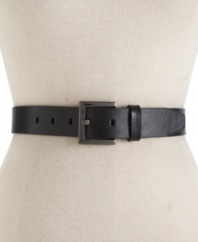 A rich, leather belt with gunmetal hardware and logo-embossed loop gives you a leg up on the competition. By Calvin Klein.