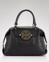 Tory Burch's leather satchel bag is the daytime bag on every label lover's list. On weekends, this bag slips on the arm with a bold coat to lend a practical dose of chic.