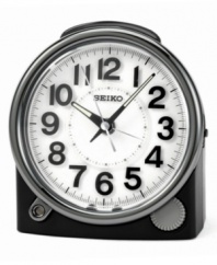 Rest assured of your wake-up call with this handsome modern clock from Seiko. Silvertone metal case and round white dial with logo and numeral indices. Luminous hands, constant light when alarm is set, ascending alarm with snooze and alarm reminder light. Three AA batteries included. Measures approximately 4-3/4 x 4-1/2 x 2-3/4 inches.