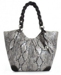 Update your seasonal look instantly with a little python print. This sleek silhouette by Mark Ecko is dressed up in shiny silver-tone hardware and braided shoulder straps with stud pyramid detailing, while a roomy interior lets you take along all the extras.