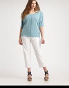 One touch and you'll see why this soft-linen top is a must-have. Plus, it features a feminine v-neckline, modern dolman sleeves and a relaxed-yet-flattering fit. V-neckElbow-length sleevesFront and back seamPull-on styleAbout 30 from shoulder to hemLinenHand washImported