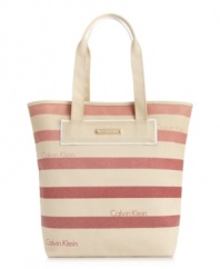 Wear with that breezy dress for rooftop cocktails or shorts and sandals by the beach, this every-occasion tote from Calvin Klein is the perfect companion. Dressed up in subtle stripes and discrete logo lettering for a look that's undecidedly delightful.