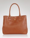 This classic tote rendered in luxurious Saffiano leather is sure to be an all-time favorite. From Tory Burch.