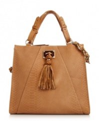 A luxe leather look from Elliott Lucca. This fashion-forward tote with shiny goldtone hardware and fun tassel detail easily takes you from a long day at work to dinner on the town.