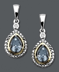 Stun her with an extra special birthday gift this year. December's stunning birthstone makes it's appearance in these delightful teardrop earrings. Crafted in 14k gold and sterling silver with a pear-cut aquamarine (3/4 ct. t.w.) and sparkling diamond accent. Approximate drop: 1 inch.