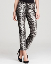 Unleash your exotic side with these snake-print MICHAEL Michael Kors Petites pants. Finish the style with a razor-sharp blazer and spark some serious fashion envy.