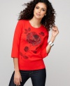 Style&co. Sport adds a bit of sparkle to this rose-printed, three-quarter sleeve tee by studding the petals with rhinestones.