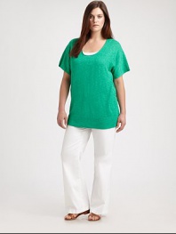 You are guaranteed a flawless fit, courtesy of a relaxed silhouette and side slits. A luxurious blend of linen and cotton gives this dolman-sleeve style impeccable softness.Round neckShort sleevesPull-on styleRibbed hemSide slitsAbout 29 from shoulder to hem56% linen/44% cottonDry cleanImported
