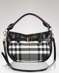 Let the British invade your closet in high style with Burberrry's signature check crossbody. Shoulder the black and white bag for timeless chic over cashmere and a color-pop coat.